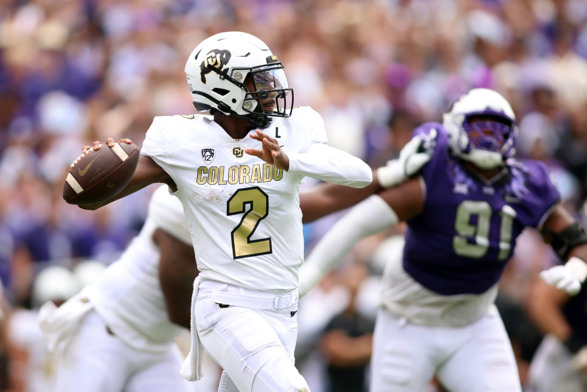 Shedeur Sanders (2) throws a pass in the second quarter against the TCU Horned Frogs at Amon G. Carter Stadium.