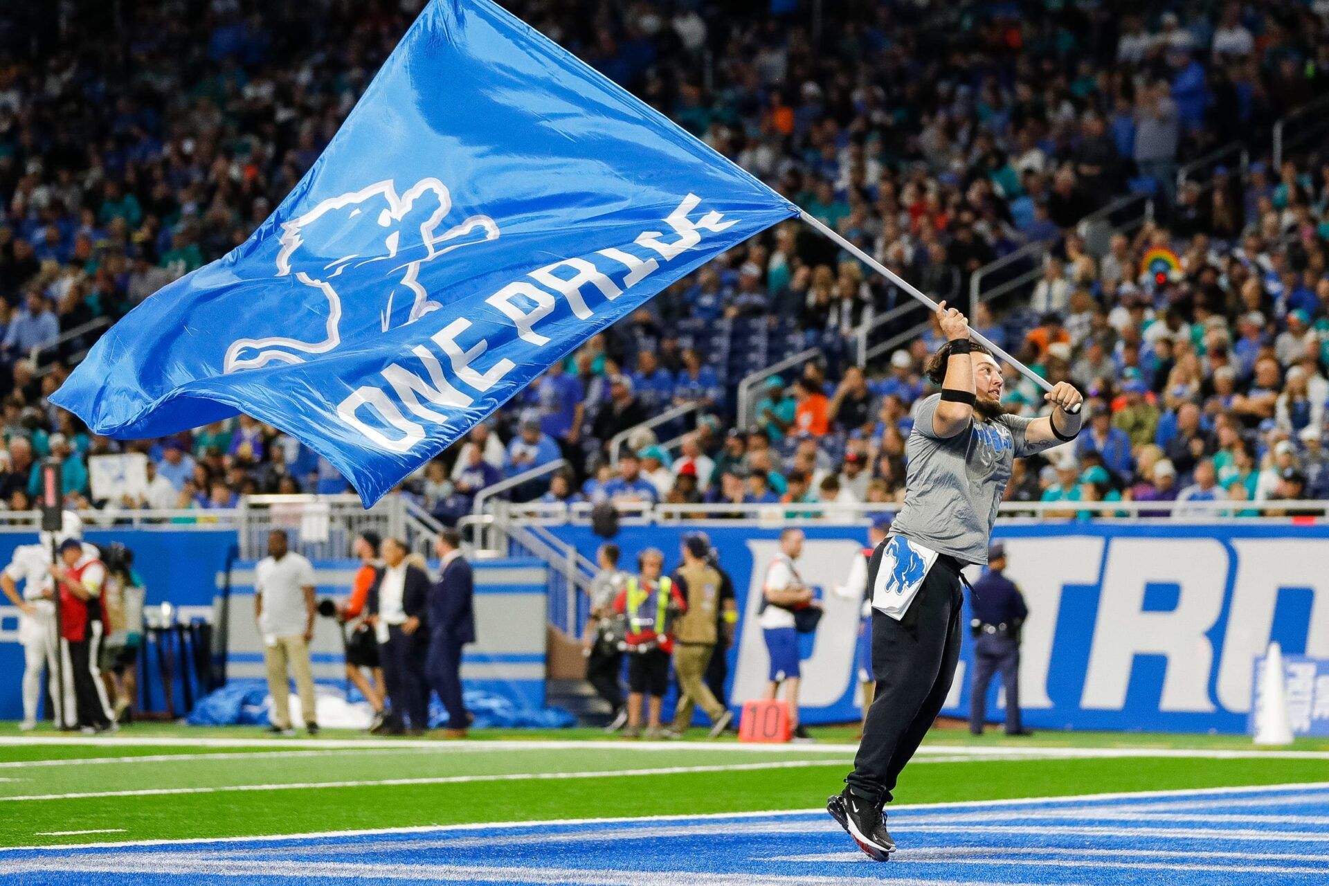 Detroit Lions celebrate a touchdown against the Miami Dolphins during the first half at Ford Field in Detroit on Sunday, Oct. 30, 2022.