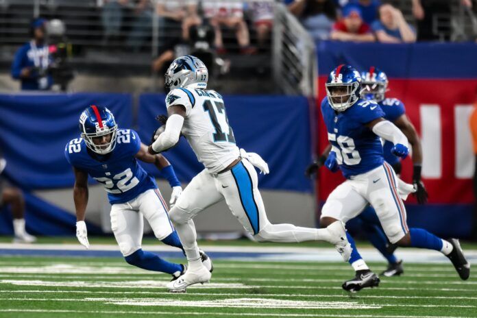 Carolina Panthers wide receiver DJ Chark Jr. (17) runs after a catch as New York Giants cornerback Adoree' Jackson (22) pursues during the second quarter at MetLife Stadium.