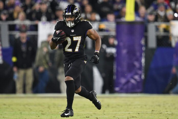 Baltimore Ravens running back J.K. Dobbins (27) rushes the ball against the Pittsburgh Steelers.