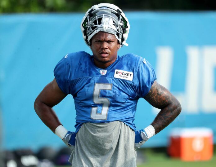 Detroit Lions running back David Montgomery (5) watches drills during training camp at team headquarters in Allen Park on Friday, July 28, 2023.