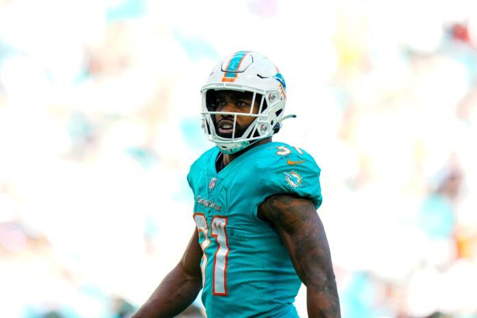 Miami Dolphins running back Raheem Mostert (31) celebrates after gaining yardage against the New York Jets during the second half at Hard Rock Stadium.