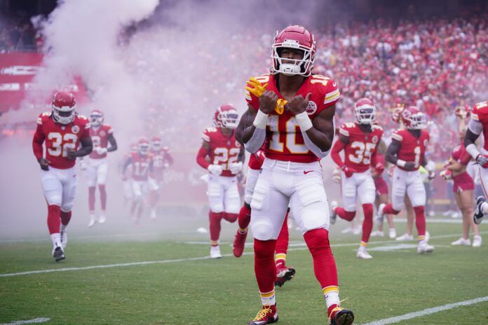 Kansas City Chiefs RB Isiah Pacheco (10) runs out on to the field.