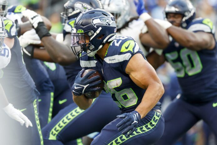 Seattle Seahawks RB Zach Charbonnet (26) runs the ball against the Dallas Cowboys.