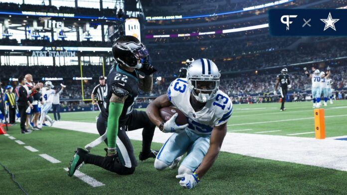 Dallas Cowboys wide receiver Michael Gallup (13) makes a touchdown catch over Philadelphia Eagles safety Marcus Epps (22) during the third quarter at AT&T Stadium.