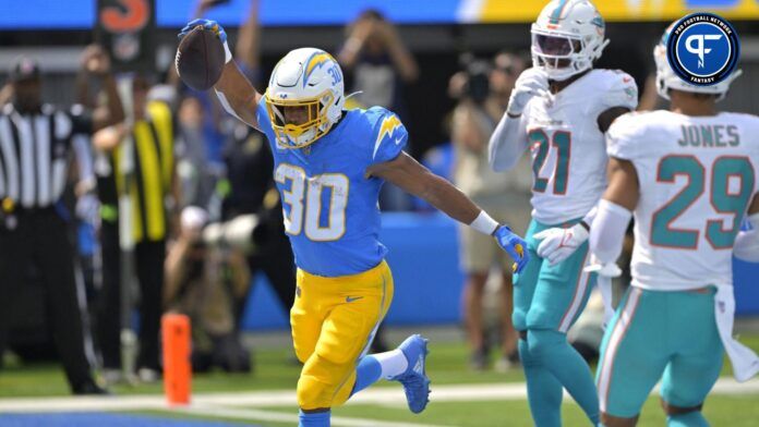 Austin Ekeler (30) celebrates after a touchdown in the first half against the Miami Dolphins at SoFi Stadium.