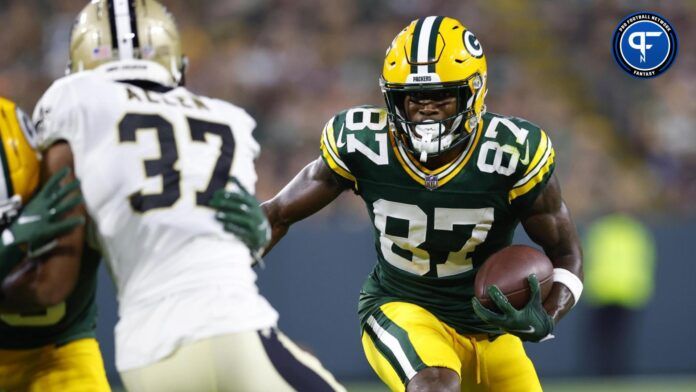 Romeo Doubs (87) rushes with the football after catching a pass during the second quarter against the New Orleans Saints at Lambeau Field.