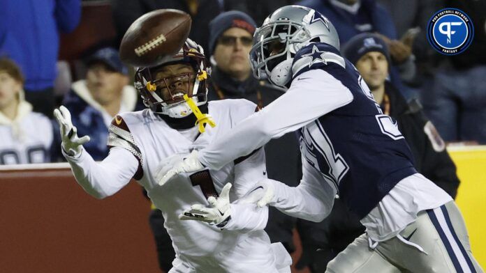 Washington Commanders wide receiver Jahan Dotson (1) attempts to catch a pass as Dallas Cowboys cornerback Trayvon Mullen (37) defends during the third quarter at FedExField.