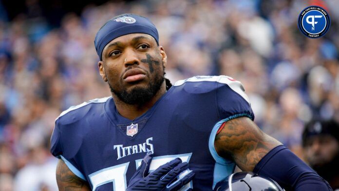 Tennessee Titans running back Derrick Henry (22) listens to the National Anthem before facing the Jacksonville Jaguars at Nissan Stadium on Dec. 11, 2022, in Nashville.