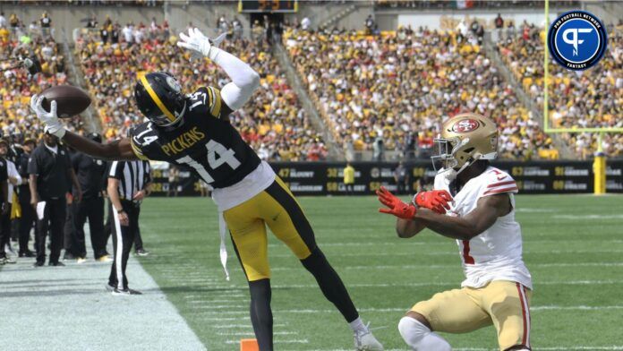 Pittsburgh Steelers wide receiver George Pickens (14) makes a catch against San Francisco 49ers cornerback Charvarius Ward (7) but can not stay in bounds during the third quarter at Acrisure Stadium. San Francisco won 30-7.