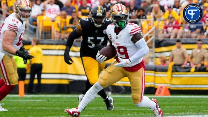 San Francisco 49ers wide receiver Deebo Samuel (19) runs with the ball after making a catch against the Pittsburgh Steelers during the first half at Acrisure Stadium.