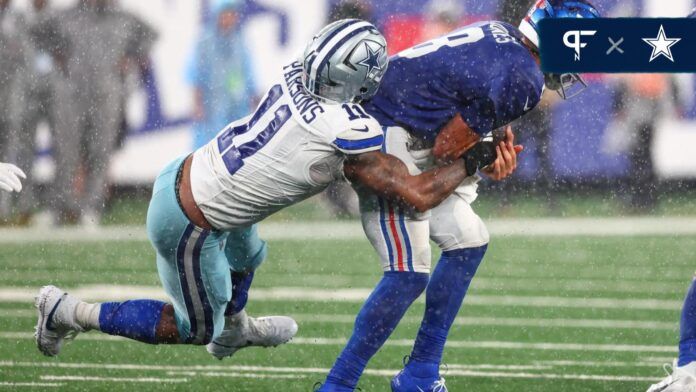 New York Giants quarterback Daniel Jones (8) is sacked by Dallas Cowboys linebacker Micah Parsons (11) during the second half at MetLife Stadium.