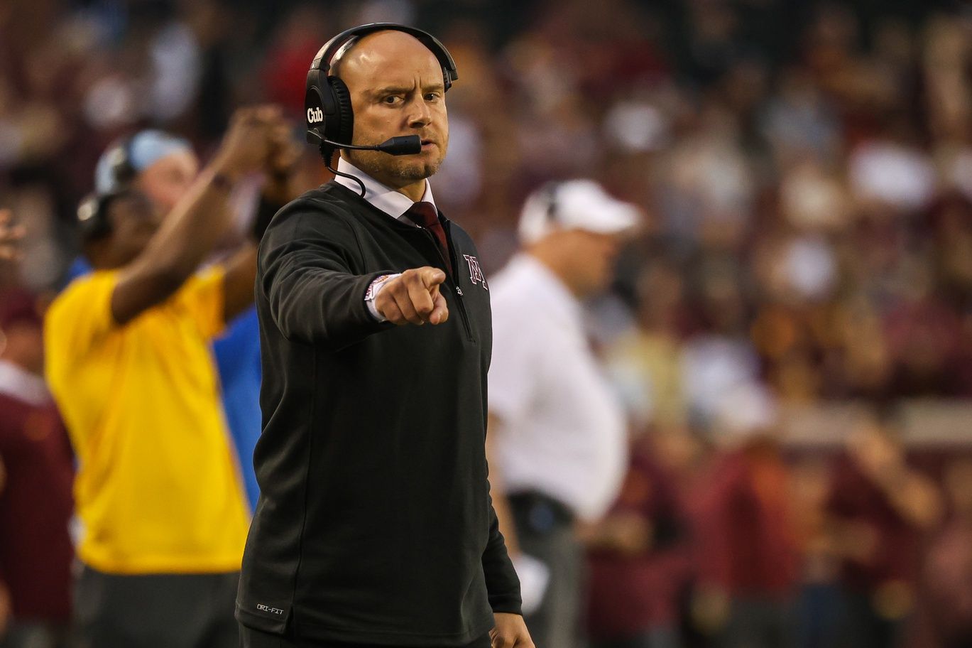 P.J. Fleck looks on during the first quarter against the Eastern Michigan Eagles at Huntington Bank Stadium.