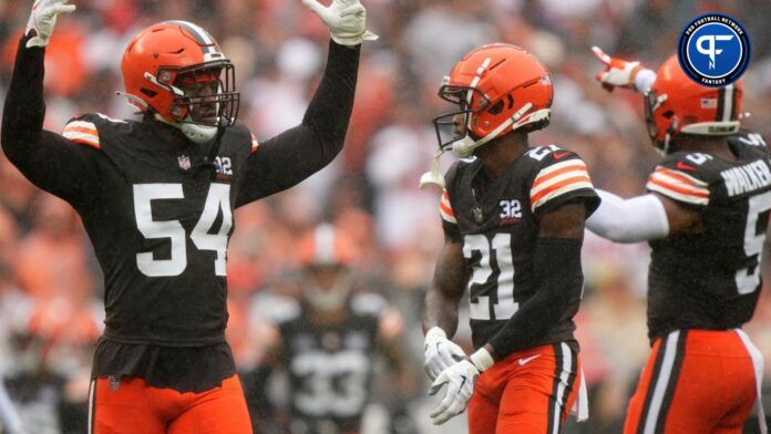 Cleveland Browns defensive end Ogbo Okoronkwo (54) fires up the crowd after the Cincinnati Bengals committed a false start in the second quarter of an NFL football game between the Cincinnati Bengals and Cleveland Browns, Sunday, Sept. 10, 2023, at Cleveland Browns Stadium in Cleveland.