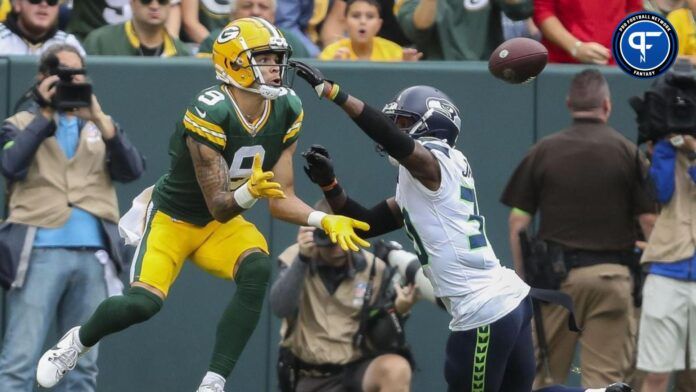 Green Bay Packers wide receiver Christian Watson (9) catches a touchdown pass against Seattle Seahawks cornerback Michael Jackson (30) during their preseason football game on Saturday, August 26, 2023, at Lambeau Field in Green Bay, Wis.