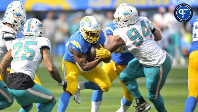 Los Angeles Chargers RB Joshua Kelley (25) rushes the ball against the Miami Dolphins.