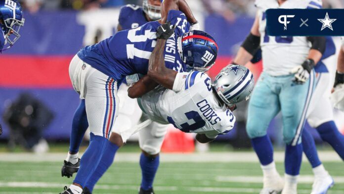 Dallas Cowboys wide receiver Brandin Cooks (3) is tackled by New York Giants cornerback Tre Hawkins III (37) during the first half at MetLife Stadium.