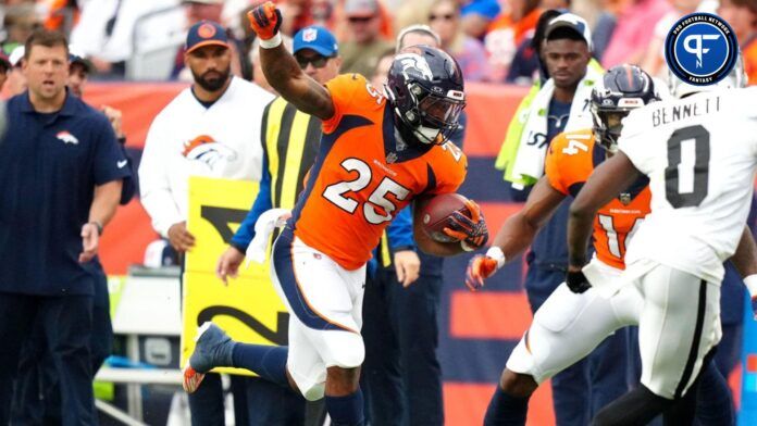 Denver Broncos running back Samaje Perine (25) carries the ball in the second quarter against the Las Vegas Raiders at Empower Field at Mile High.