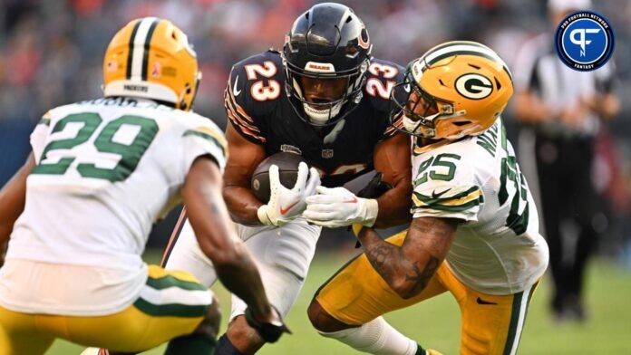 Chicago Bears RB Roschon Johnson (23) rushes with the ball against the Green Bay Packers.