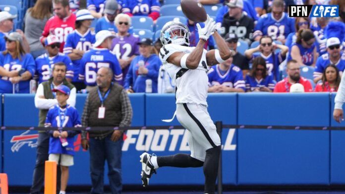 Las Vegas Raiders WR Tre Tucker (11) warms up before the game against the Buffalo Bills.