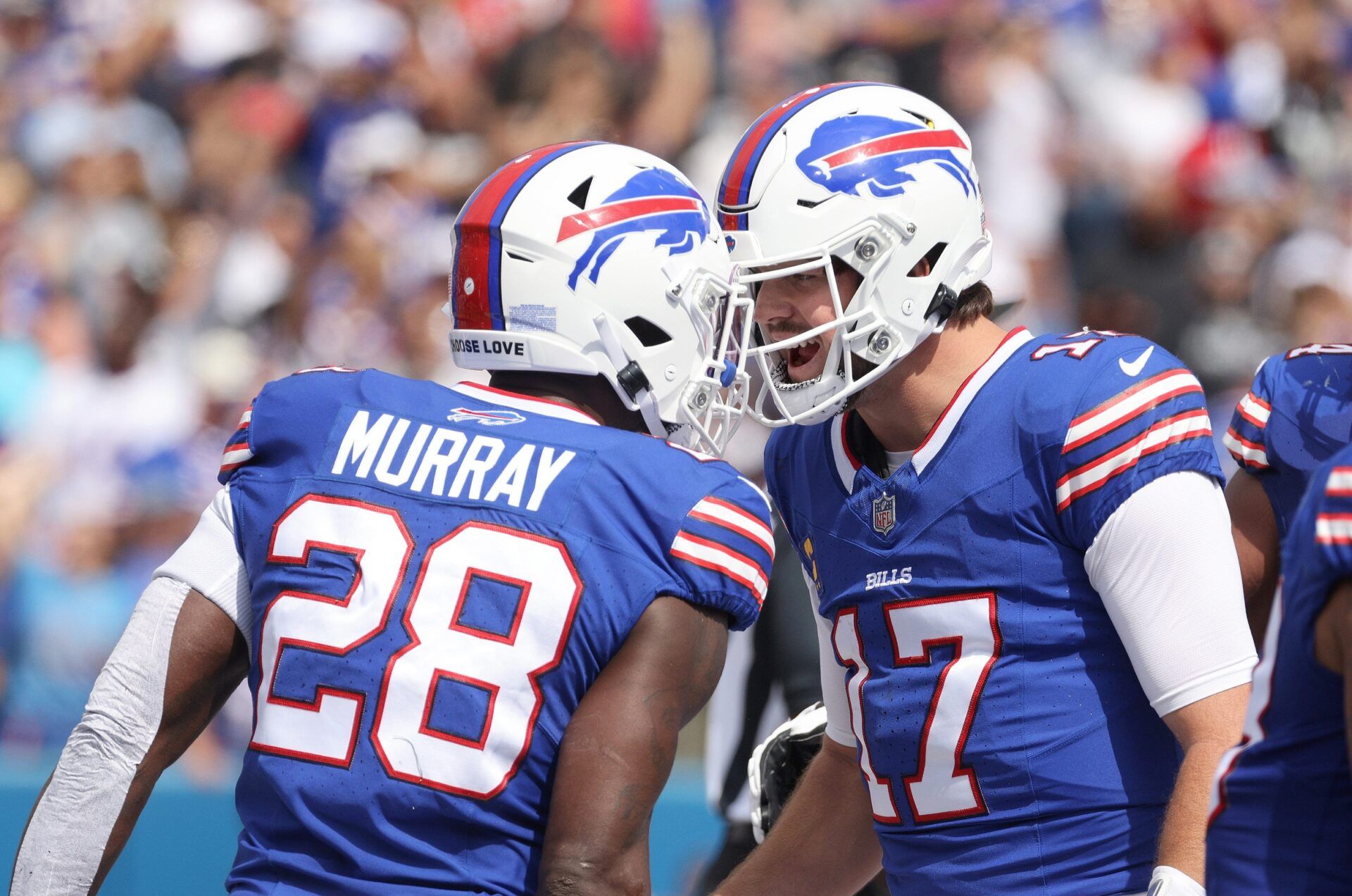 Bills quarterback Josh Allen congratulates Latavius Murray after his touchdown.