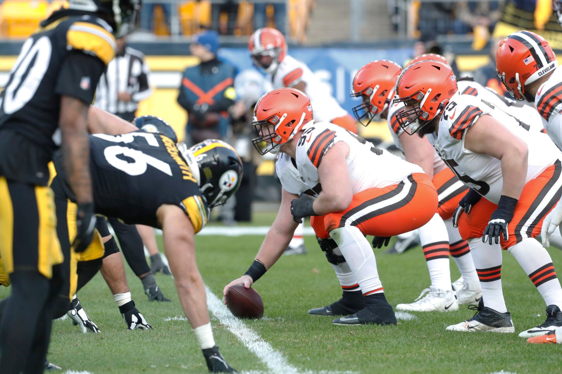 Cleveland Browns center Ethan Pocic (55) prepares to snap the ball against the Pittsburgh Steelers during the fourth quarter at Acrisure Stadium.