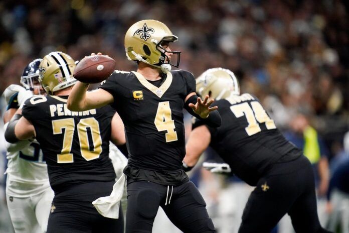 New Orleans Saints QB Derek Carr (4) throws a pass against the Tennessee Titans.