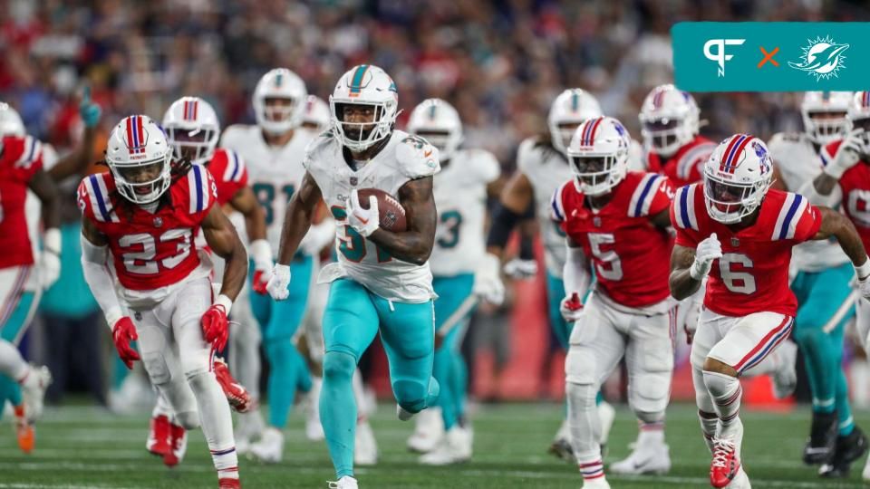 Miami Dolphins RB Raheem Mostert (31) runs for a touchdown against the New England Patriots.