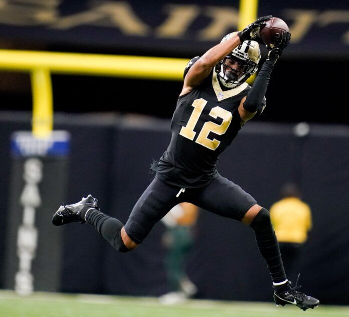 New Orleans Saints wide receiver Chris Olave (12) pulls in a catch in the fourth quarter against the Tennessee Titans at the Caesars Superdome in New Orleans, La.,