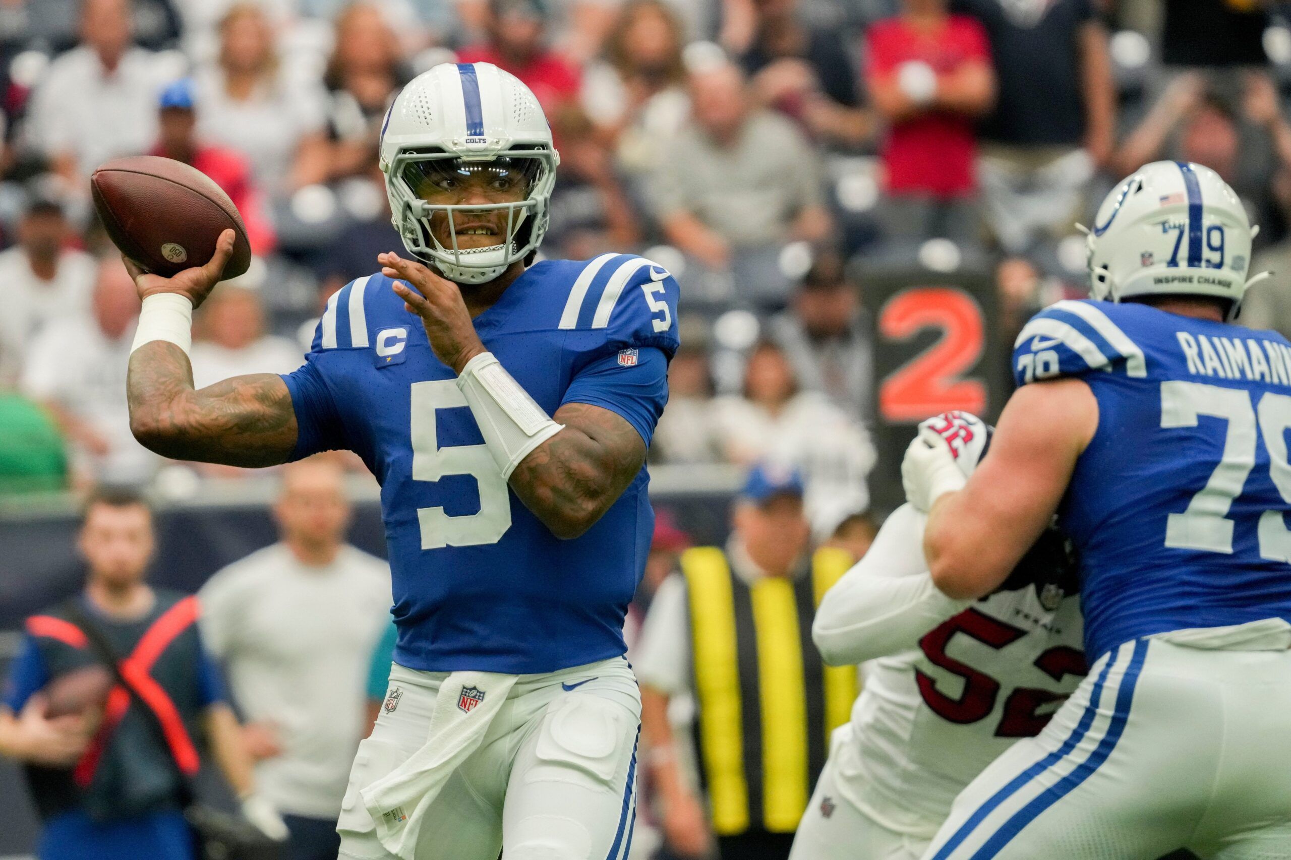 Anthony Richardson (5) draws back to pass Sunday, Sept. 17, 2023, during a game against the Houston Texans at NRG Stadium in Houston.