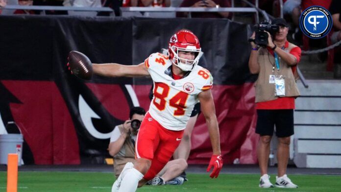 Kansas City Chiefs wide receiver Justin Watson celebrates after scoring touchdown.