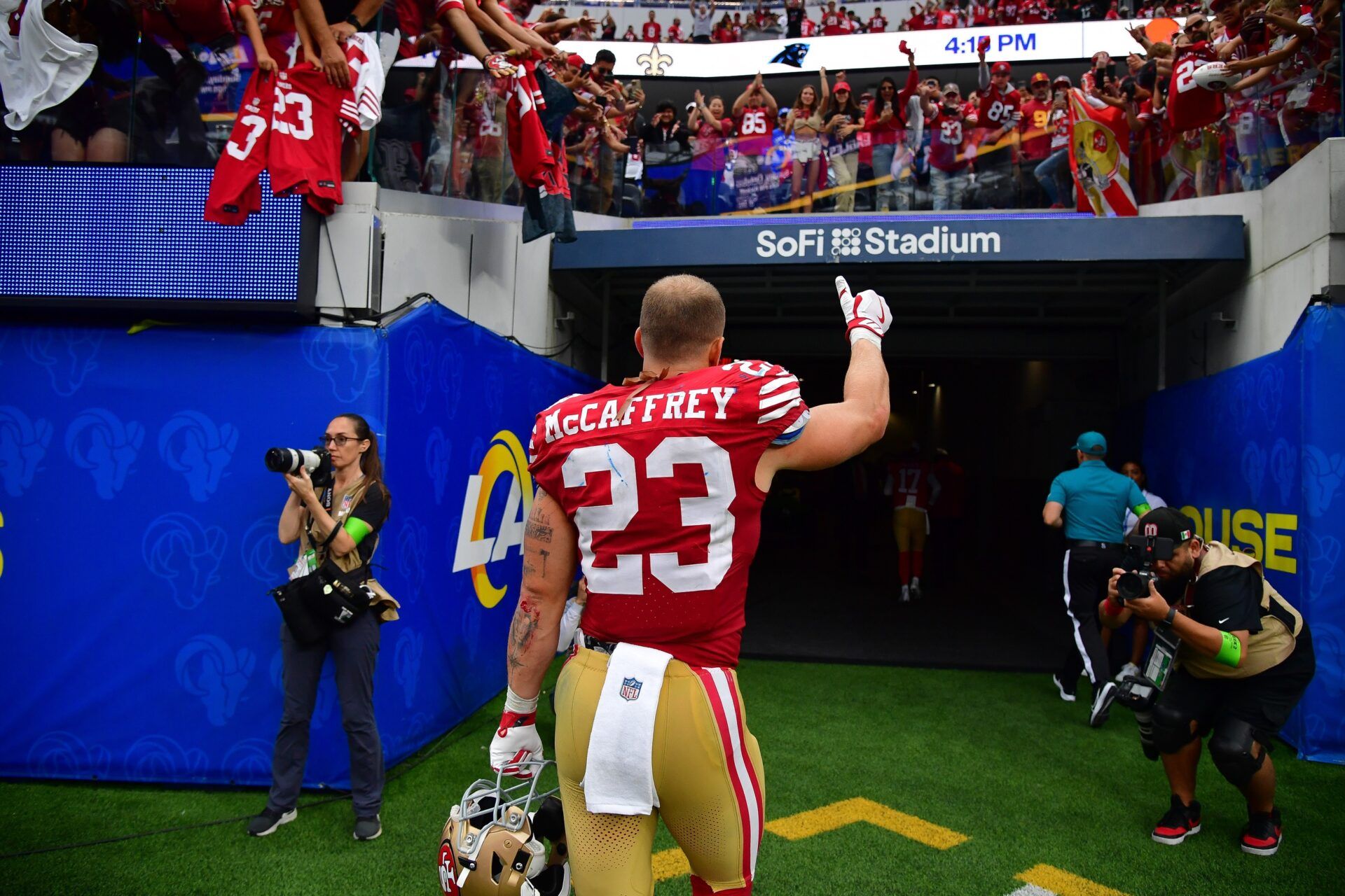 San Francisco 49ers RB Christian McCaffery celebrates victory over Rams.