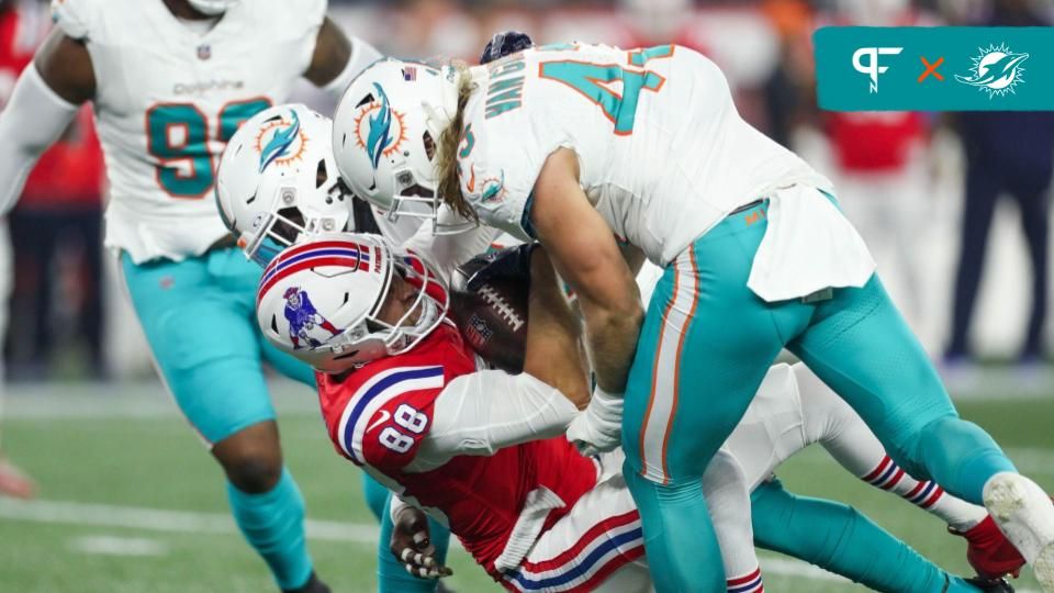 Andrew Van Ginkel (43) tackles New England Patriots tight end Mike Gesicki (88) during the first half at Gillette Stadium.