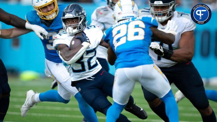 Tyjae Spears (32) breaks a long run against the Chargers during their NFL game at Nissan Stadium.