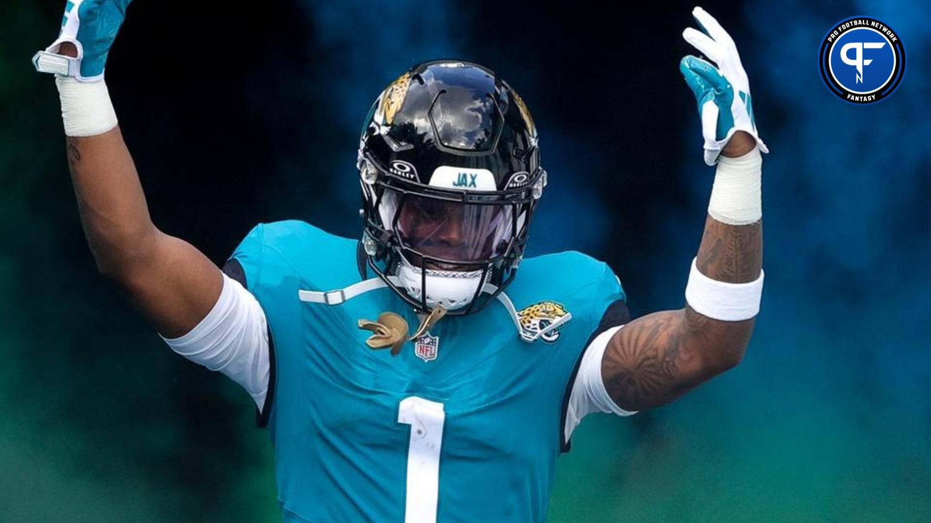 Jacksonville Jaguars running back Travis Etienne Jr. (1) is introduced before a game against the Kansas City Chiefs at EverBank Stadium.