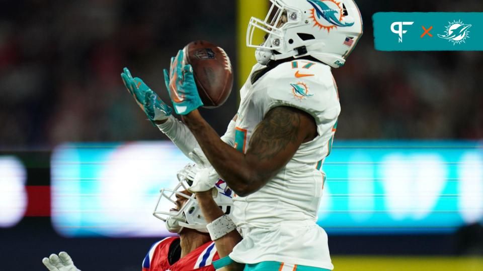 Miami Dolphins WR Jaylen Waddle (17) catches a pass against the New England Patriots.