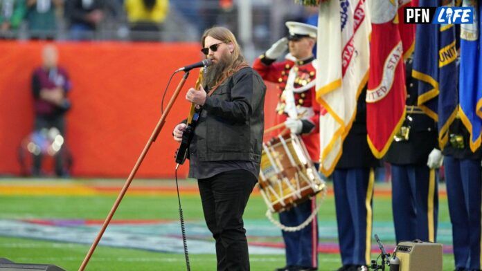 Chris Stapleton sings the national anthem before Super Bowl LVII between the Kansas City Chiefs and the Philadelphia Eagles at State Farm Stadium.