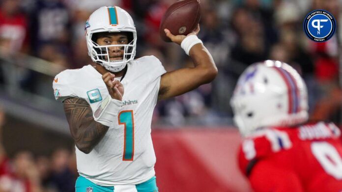 Tua Tagovailoa (1) passes the ball during the second half against the New England Patriots at Gillette Stadium.