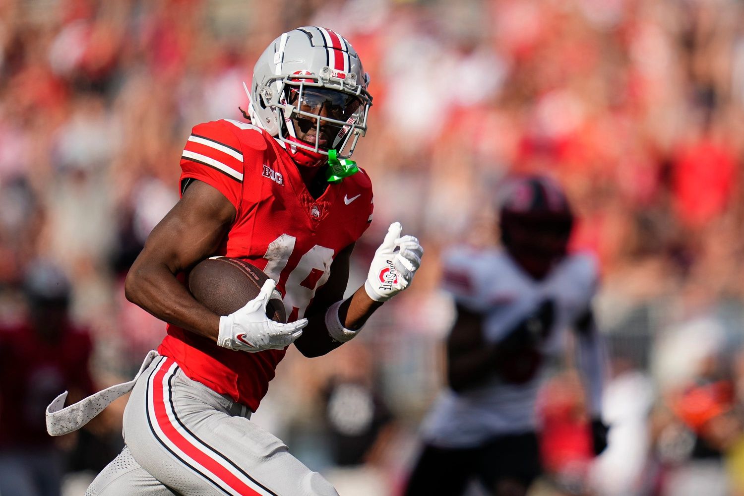 Ohio State Buckeyes wide receiver Marvin Harrison Jr. (18) runs for a touchdown during the NCAA football game against the Western Kentucky Hilltoppers at Ohio Stadium. Ohio State won 63-10.