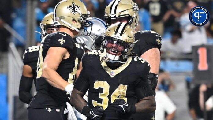 New Orleans Saints running back Tony Jones Jr. (34) celebrates after scoring a touchdown in the fourth quarter at Bank of America Stadium.