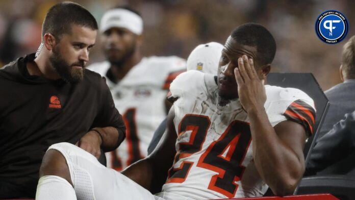 Cleveland Browns running back Nick Chubb (24) is taken from the field on a cart after suffering an apparent injury against the Pittsburgh Steelers during the second quarter at Acrisure Stadium.