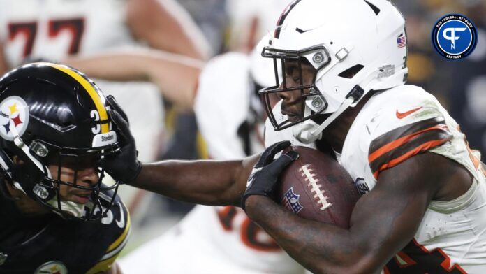 Cleveland Browns RB Jerome Ford delivers stiff arm to Steelers defender.