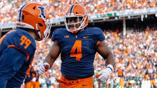 Jer'Zhan Newton runs off the field after a play.