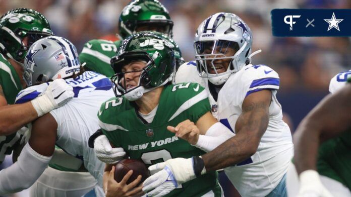 New York Jets quarterback Zach Wilson (2) is sacked by Dallas Cowboys linebacker Micah Parsons (11) in the first quarter at AT&T Stadium.