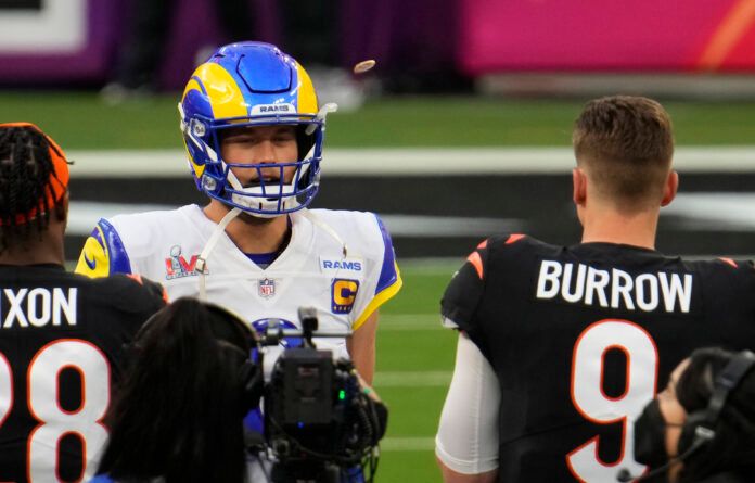 Los Angeles Rams quarterback Matthew Stafford (9) and Cincinnati Bengals quarterback Joe Burrow (9) watch the coin toss before Super Bowl LVI at SoFi Stadium.