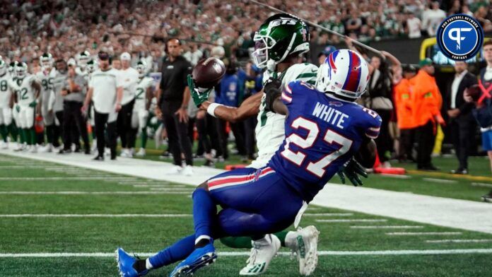 Garrett Wilson (17) makes a touchdown catch with pressure from Buffalo Bills cornerback Tre'Davious White (27) in the second half.