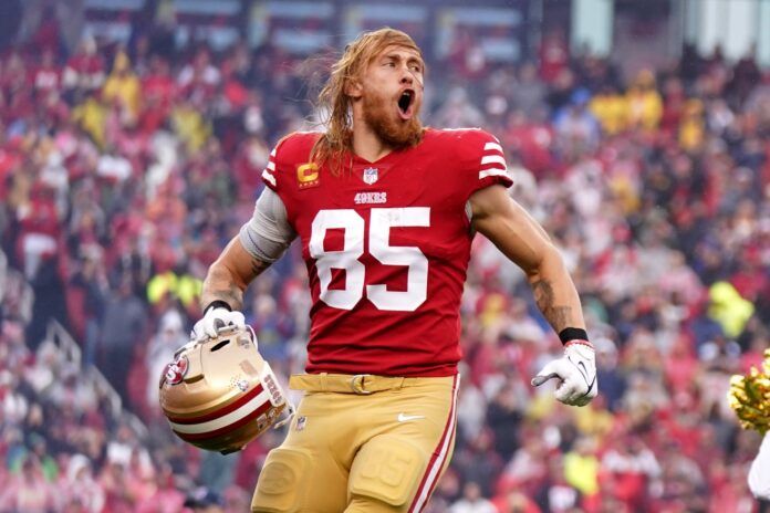 George Kittle (85) runs onto the field before a wild card game against the Seattle Seahawks at Levi's Stadium.