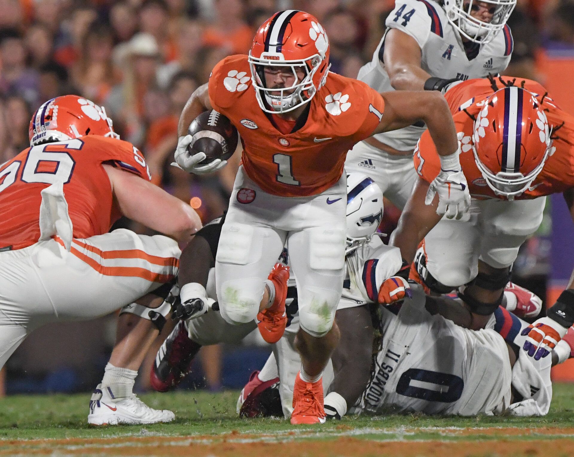 Clemson running back Will Shipley (1) runs near Florida Atlantic linebacker Jarrett Jerrels (44) during the second quarter against Florida Atlantic at Memorial Stadium.