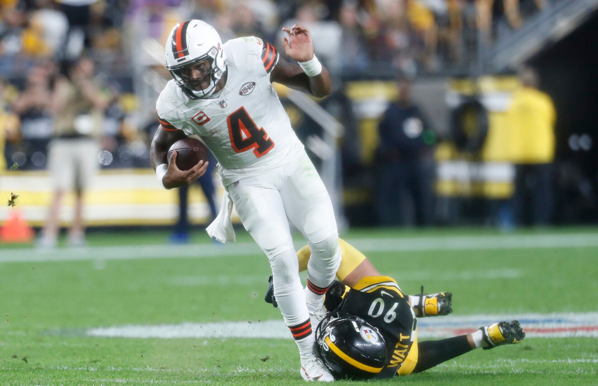 Pittsburgh Steelers linebacker T.J. Watt (90) sacks Cleveland Browns quarterback Deshaun Watson (4) during the second quarter against at Acrisure Stadium.