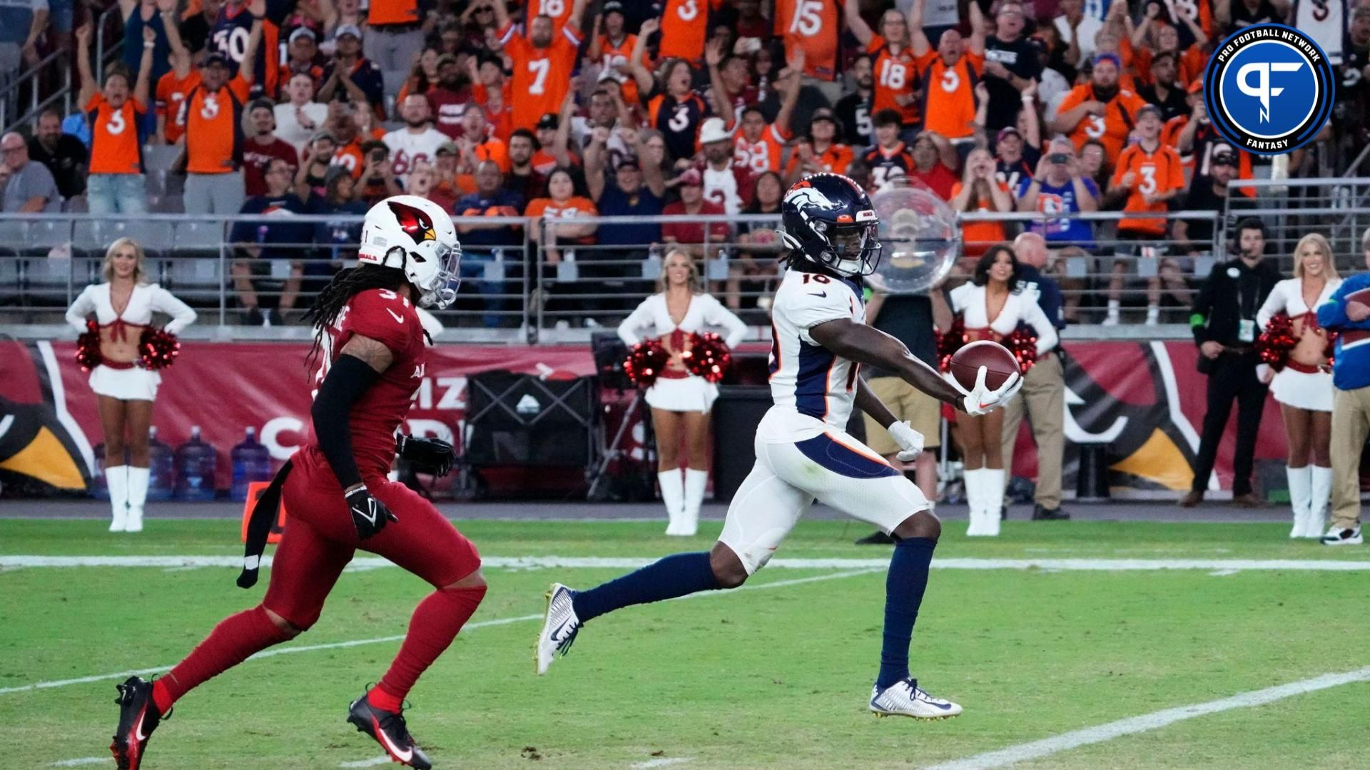 Denver Broncos wide receiver Jerry Jeudy (10) scores a touchdown past Arizona Cardinals safety Andre Chachere (31) during a preseason game at State Farm Stadium in Glendale on Aug. 11, 2023.